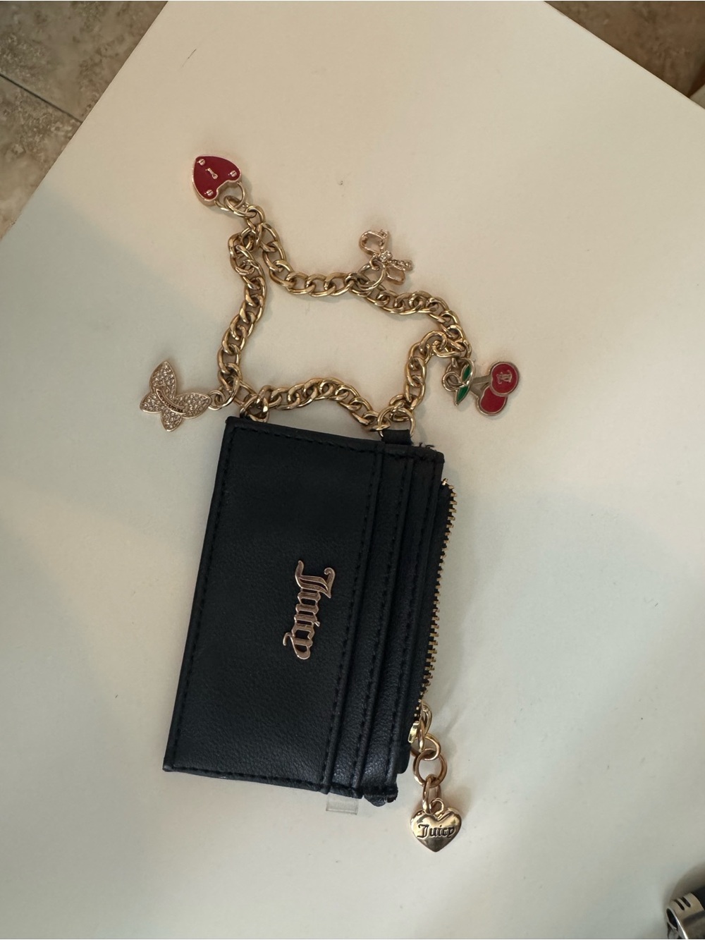 Juicy Couture Black Card Case with Gold Charm Chain and Red Charms